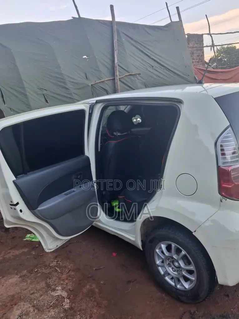 Toyota Passo 1.0 FWD 2009 Pearl
