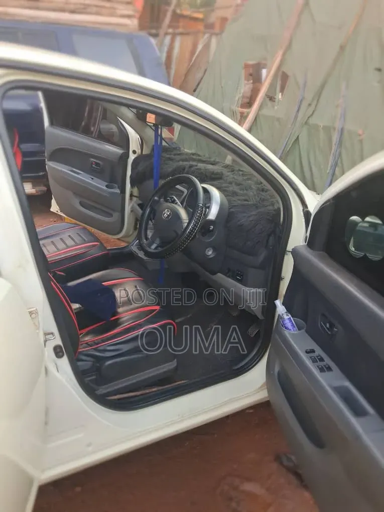 Toyota Passo 1.0 FWD 2009 Pearl