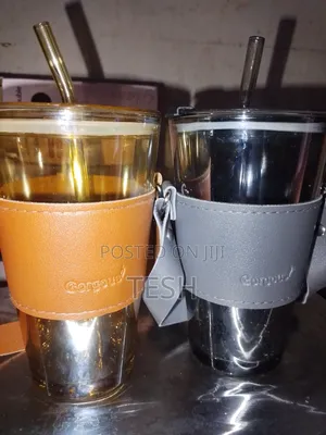 A Double Drinking Glass,Both Coffee And Juice
