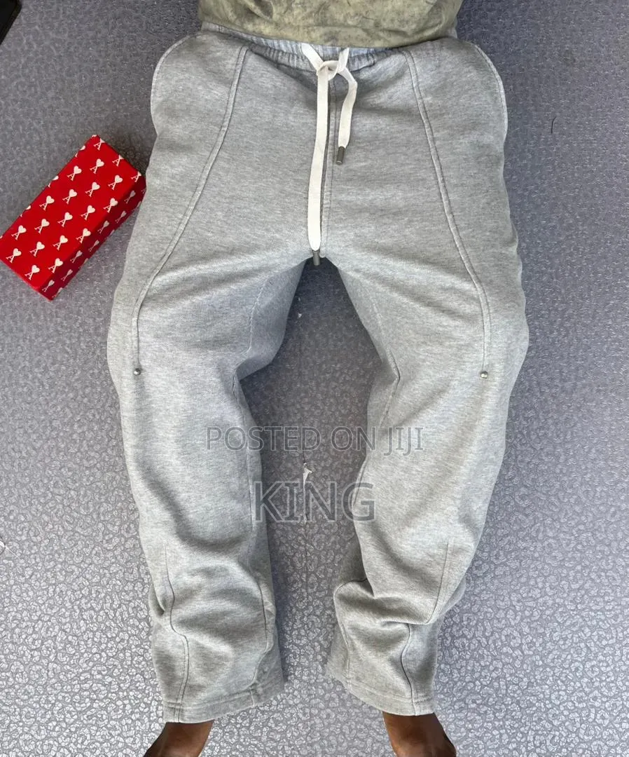 Unisex Open-Hem Buggy Sweaterpants in Grey and Black.