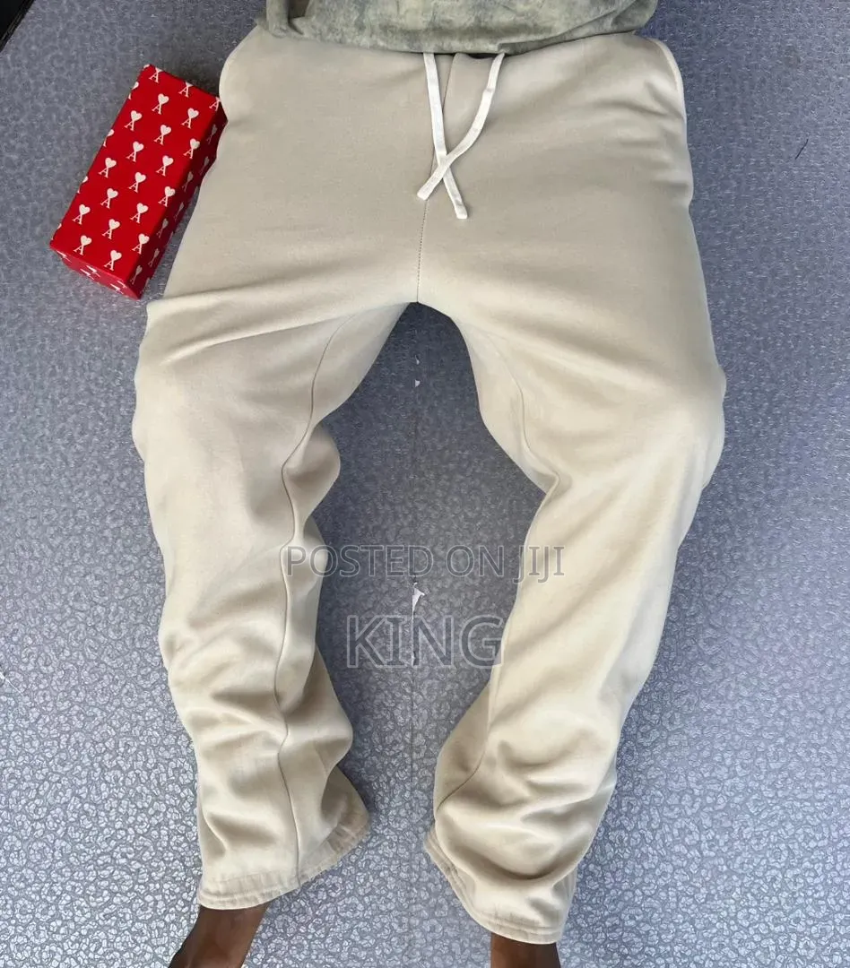 Unisex Open-Hem Buggy Sweaterpants in Grey and Black.