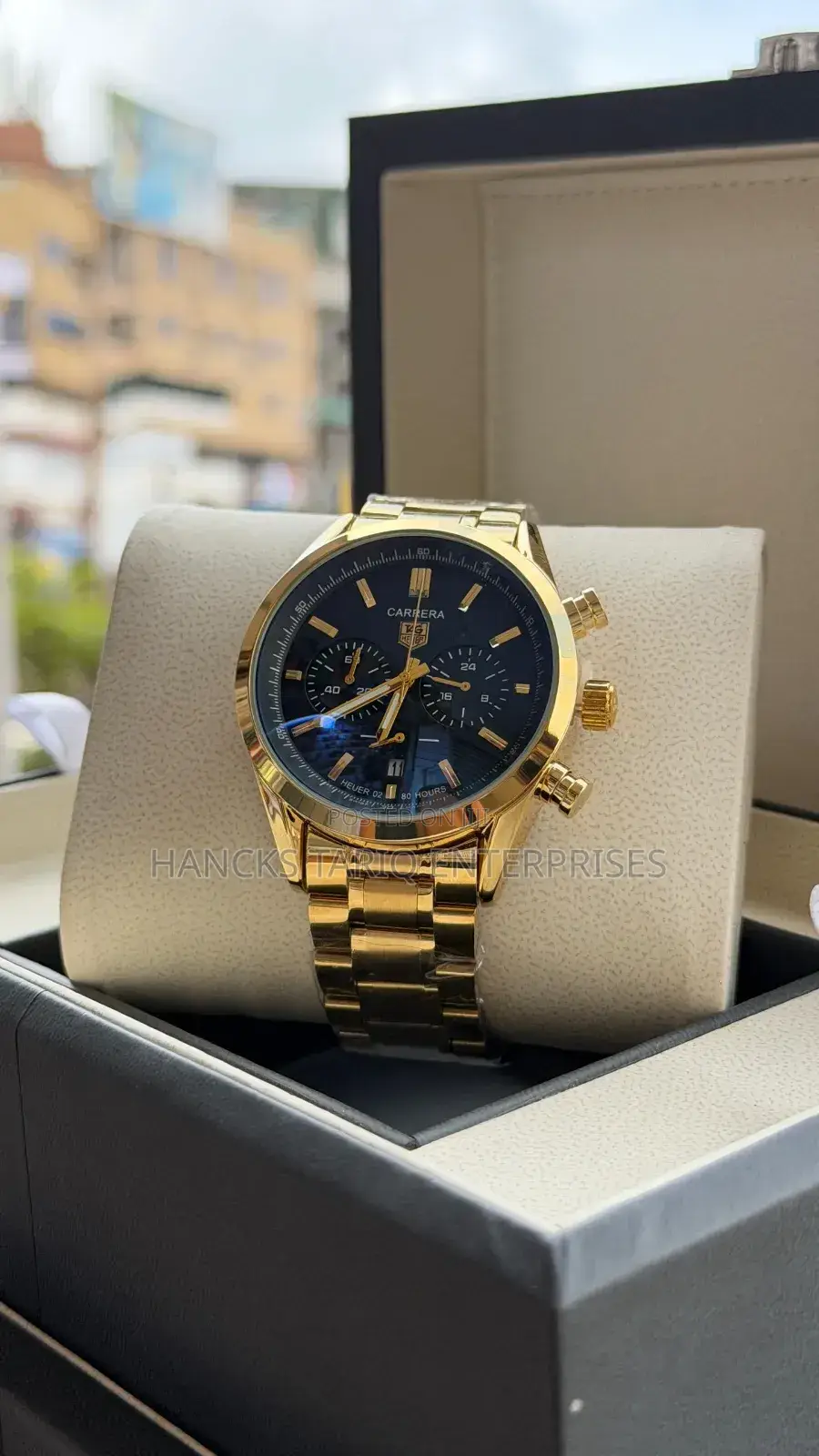 Luxury Gold-Toned Tag Heuer Carrera Chronograph Watch.