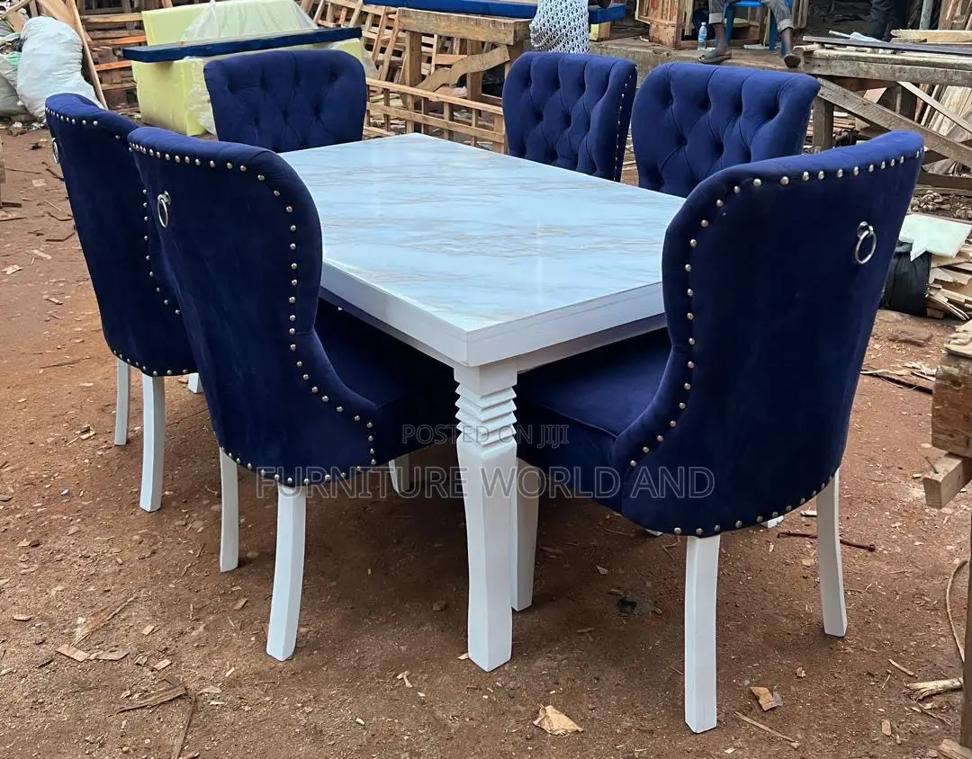 A Blue Six Sitter Dining Table