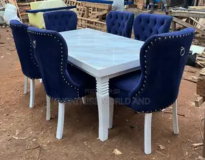 A Blue Six Sitter Dining Table