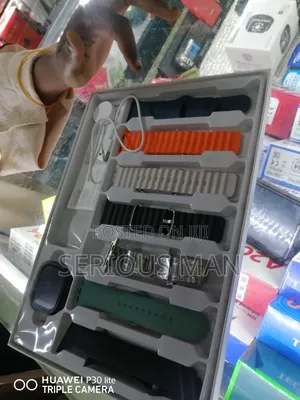 TLTM-M26 Ultra 2 10 Smart Watch Packaged as a 7-in-1 Set