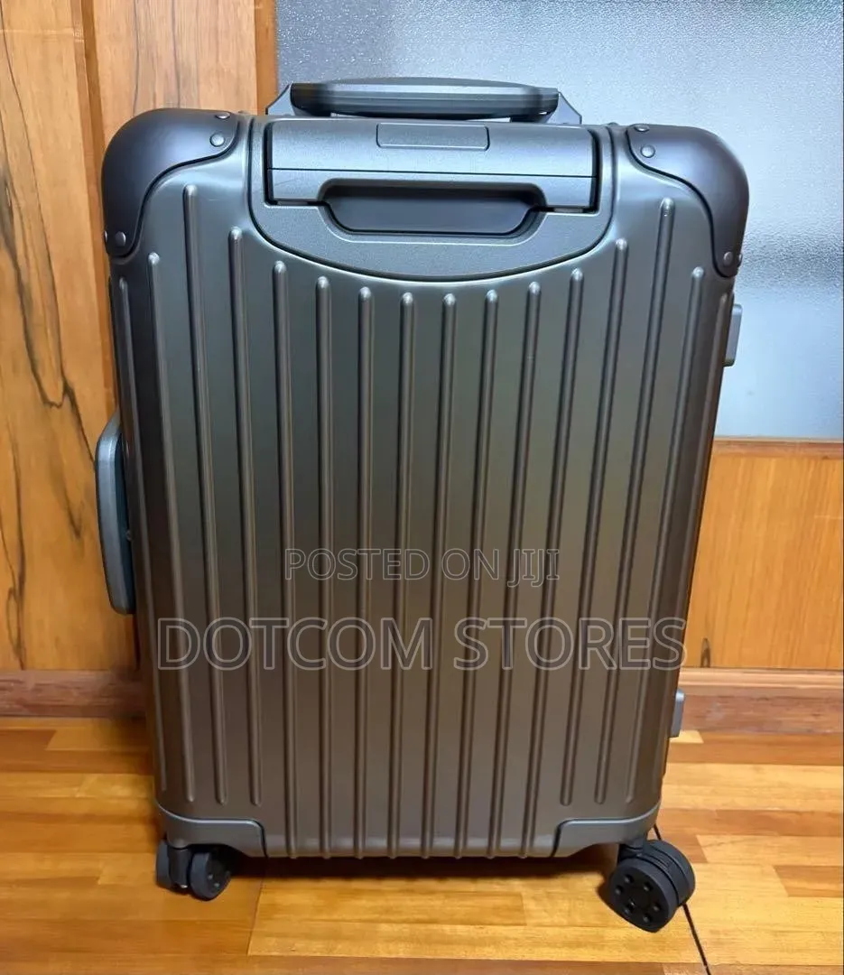 Medium Original Aluminum Cabin Twist Suitcase