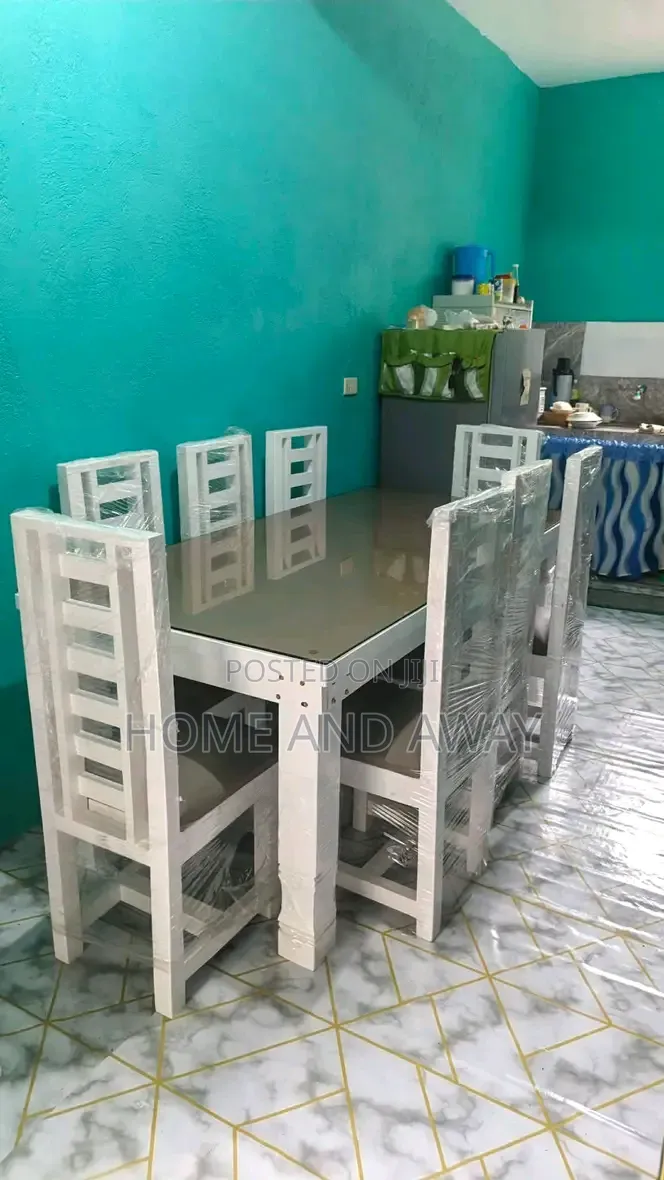 6 Seaters Glassed Wooden Dining Table Sets in Any Colour 2,000,000/-