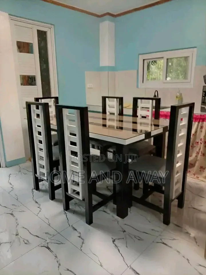 6 Seaters Glassed Wooden Dining Table Sets in Any Colour 2,000,000/-
