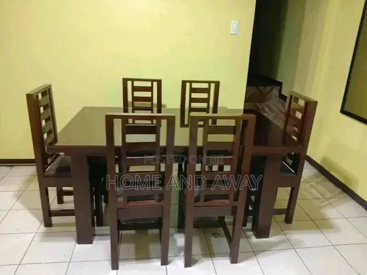 6 Seaters Glassed Wooden Dining Table Sets in Any Colour 2,000,000/-