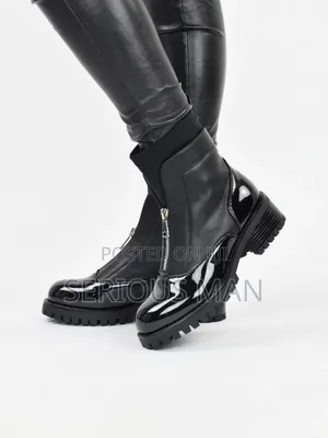 Black Ankle Boots Showcase a Bold,
