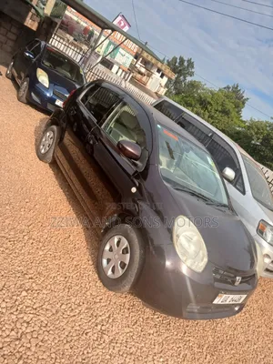 Toyota Passo 1.0 FWD 2011 Maroon