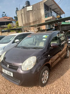 Toyota Passo 1.0 FWD 2011 Maroon