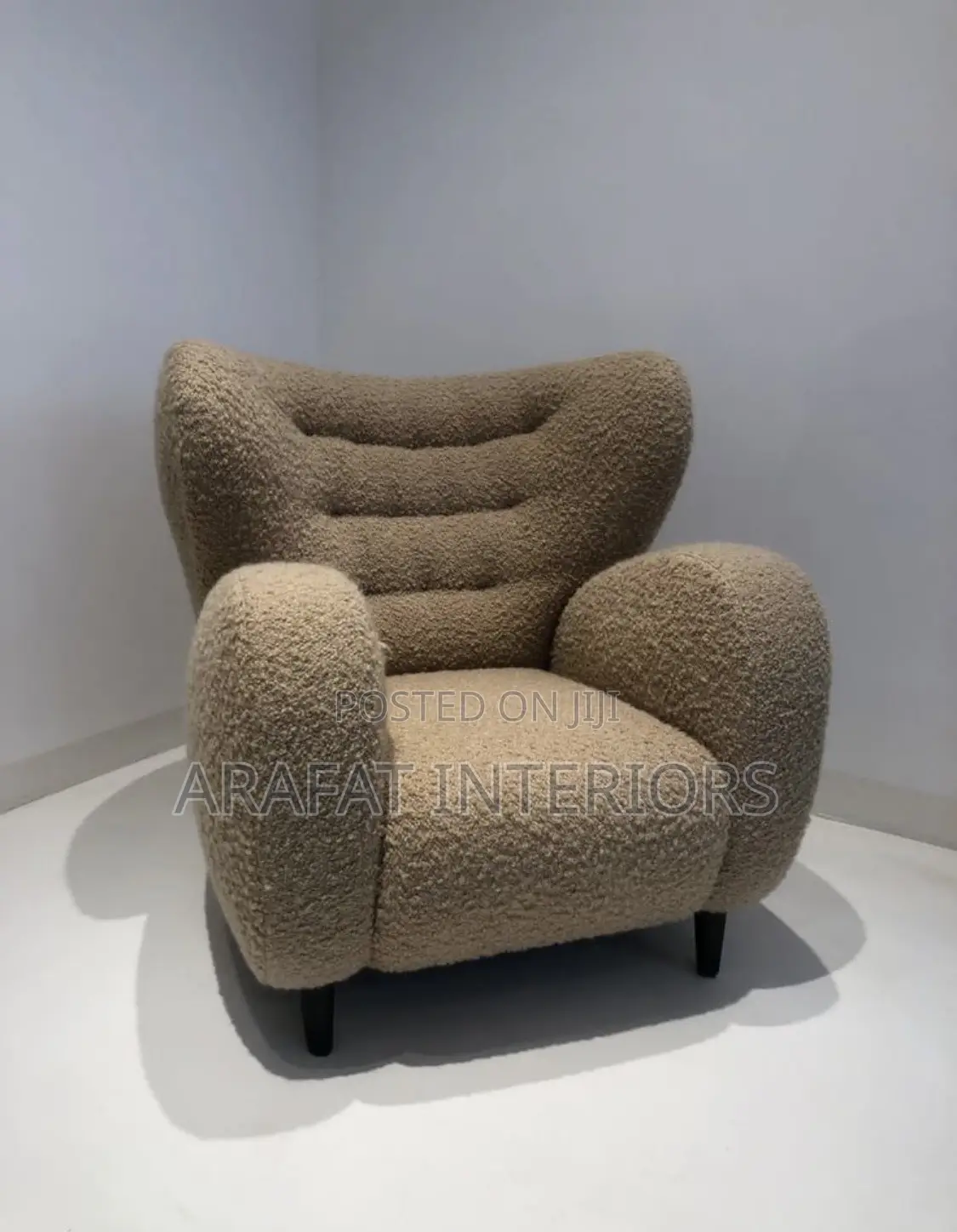 Beige Textured Curved Armchair With Black Legs