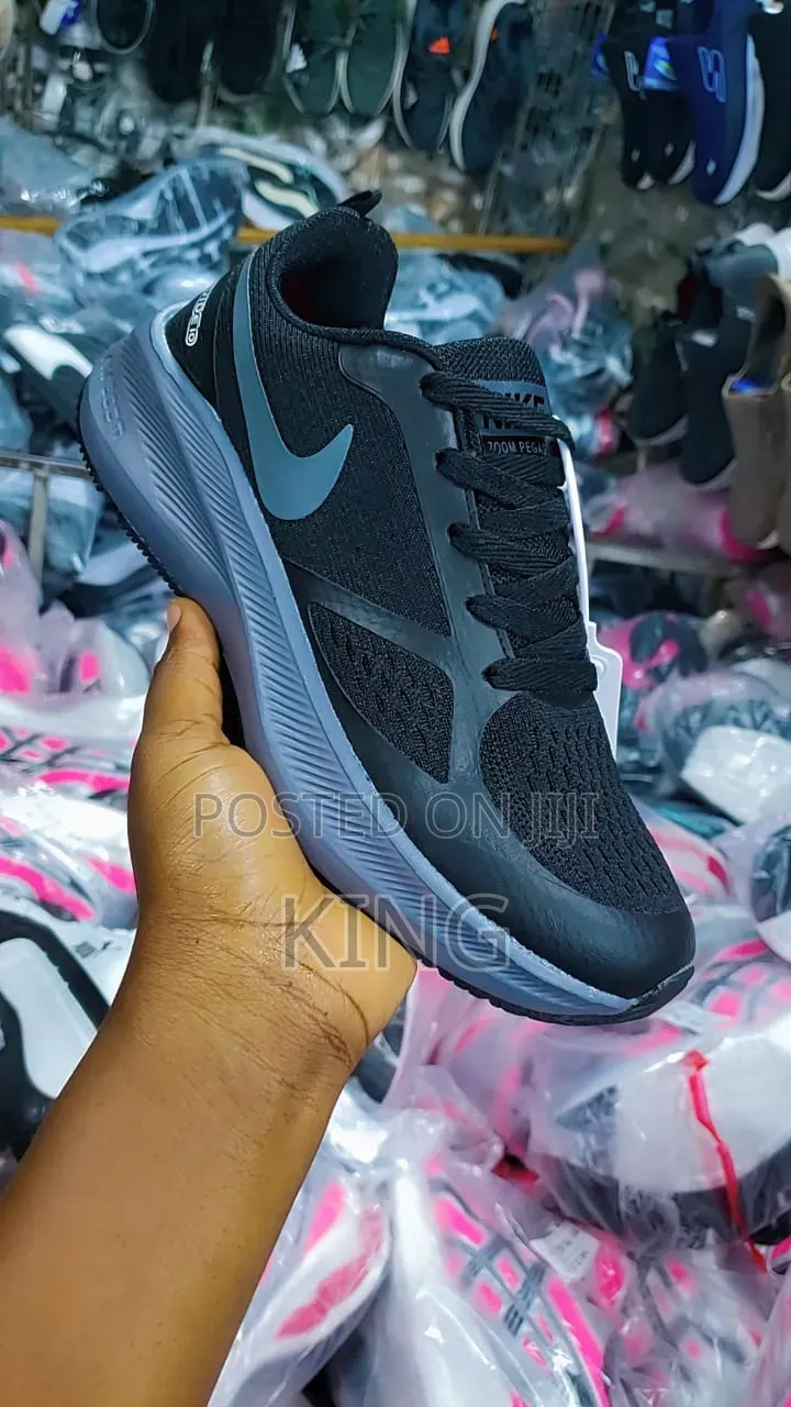 Nike Zoomx Sneakers. Black, White, Pink