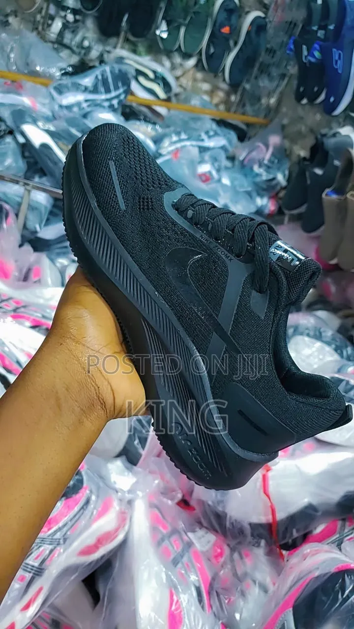 Nike Zoomx Sneakers. Black, White, Pink