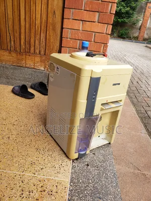 Dispenser for Cooling an Warming Drinking Water