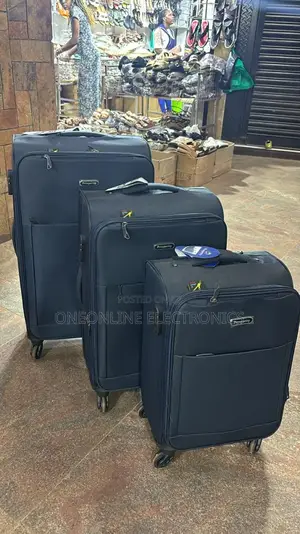 Set of Three Navy Fabric Prosperity Brand Suitcases