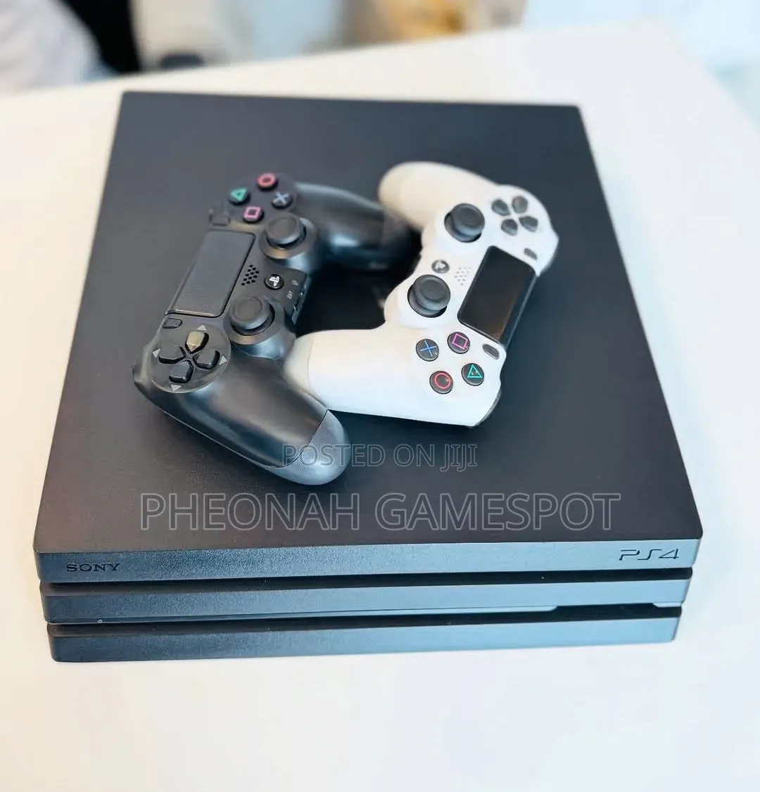 Ps4 Pro, 32 Games, 2 Pads: Heavy Console for True Expert Gamer