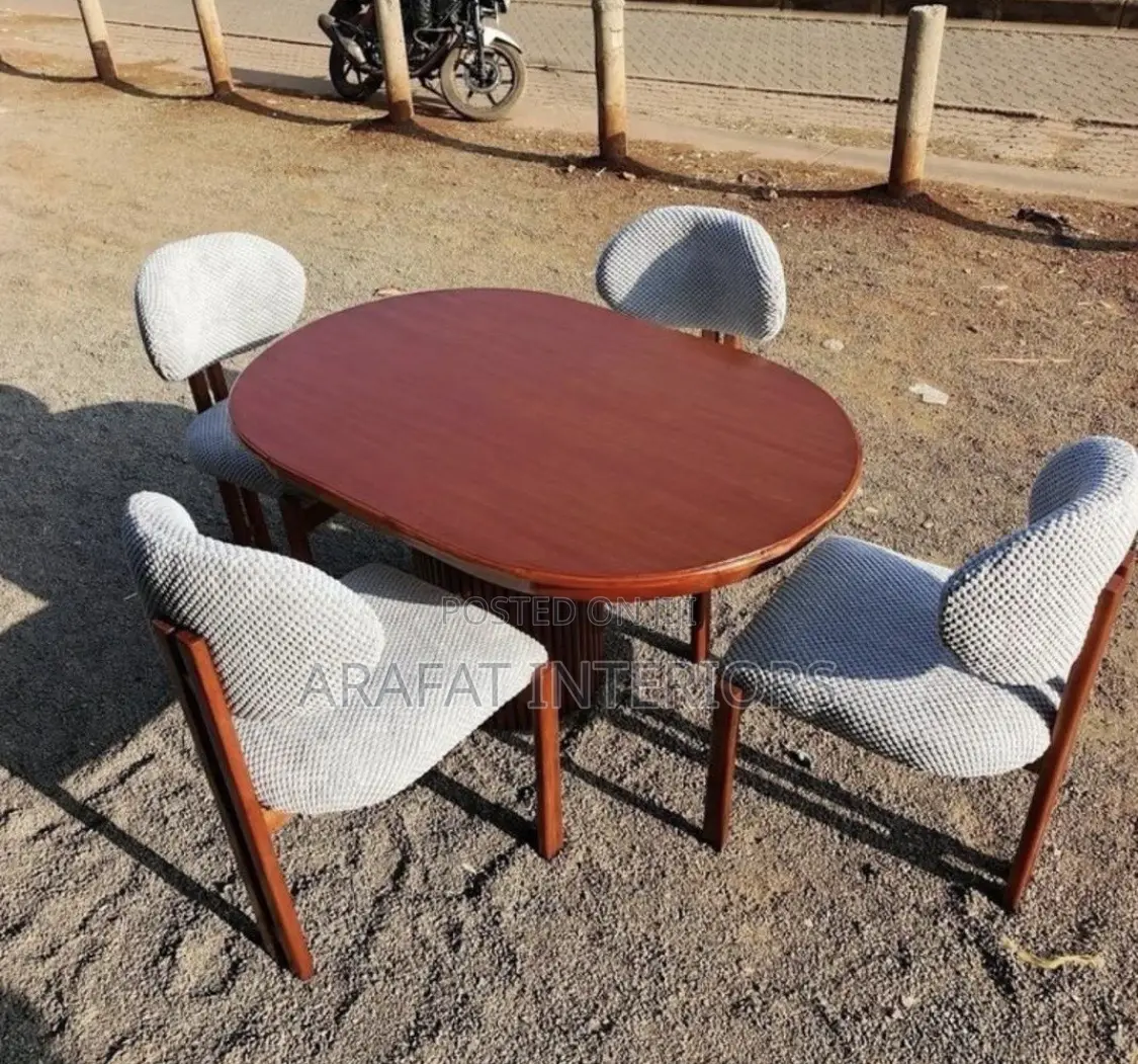 Oval Wooden Dining Table With 4 Upholstered Chairs