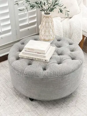 Modern Light Gray Button Tufted Round Ottoman on Casters