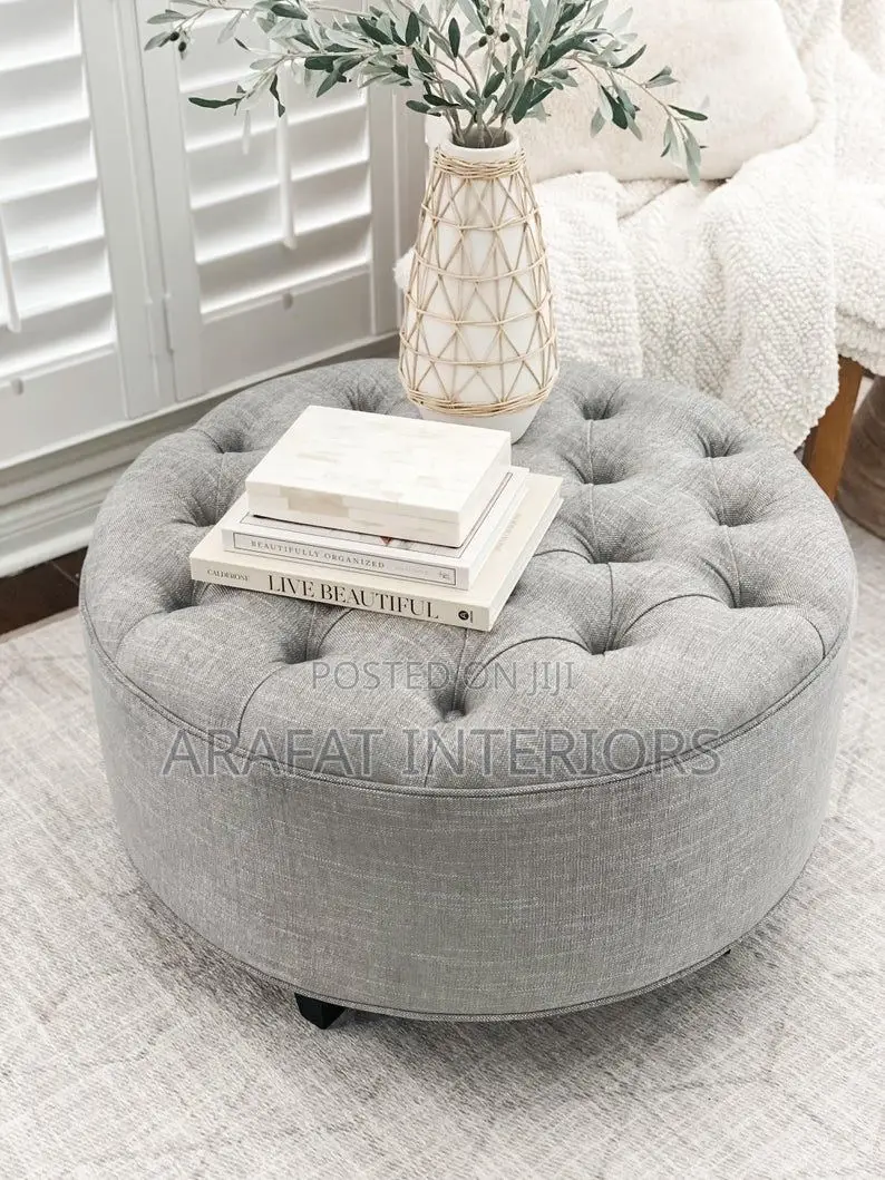 Modern Light Gray Button Tufted Round Ottoman on Casters