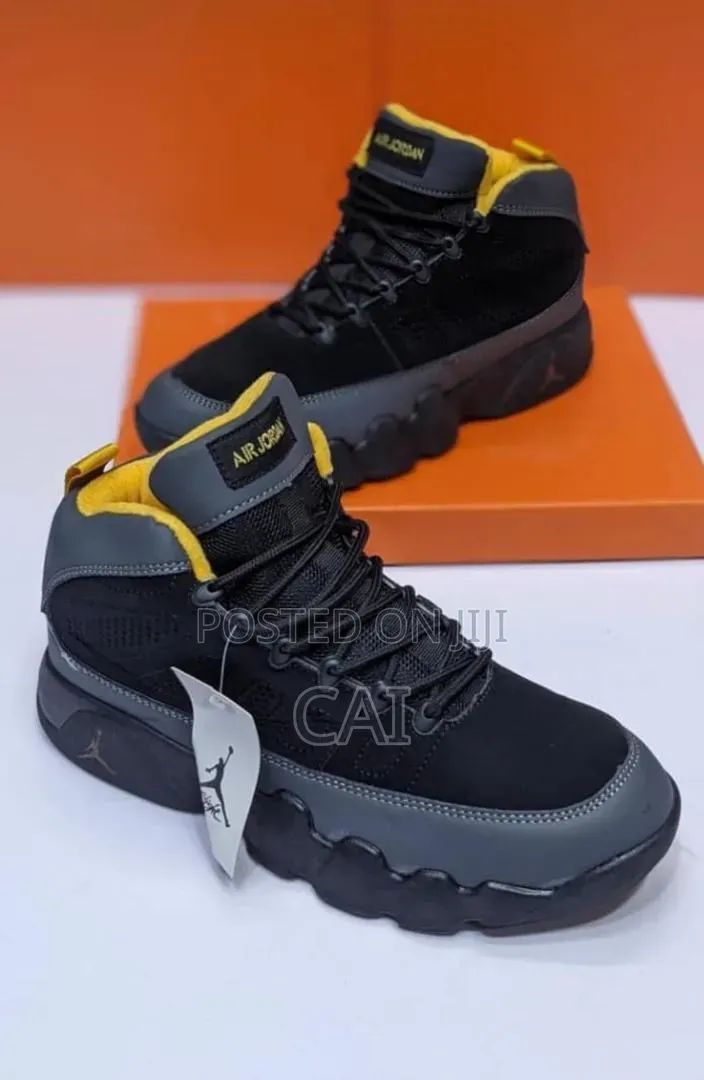 Nike Air Jordan 9 Retro Sneakers, Featuring a Charcoal Grey and Black
