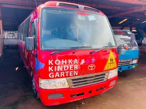 Toyota Coaster 2013 Red