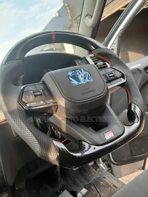 A Steering Wheel That Allows Radio Control and Other Accessories