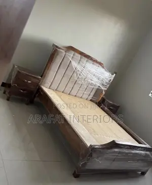 Wooden Bed Frame Featuring a Beautiful Tall Upholstered Headboard!
