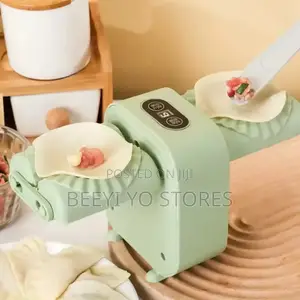 Wanhengda Electric Double Head Dumpling Maker.