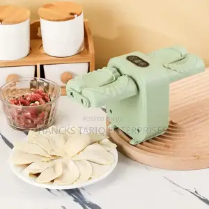 Wanhengda Electric Double Head Dumpling Maker.