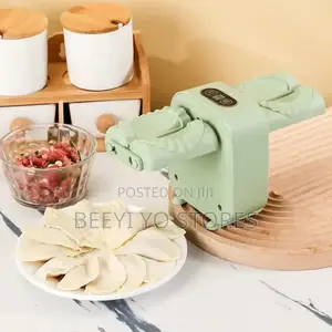Wanhengda Electric Double Head Dumpling Maker.