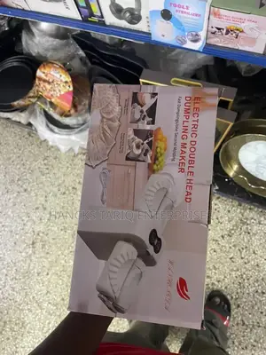 Wanhengda Electric Double Head Dumpling Maker.