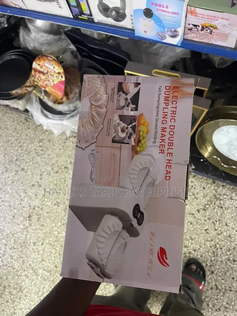 Wanhengda Electric Double Head Dumpling Maker.