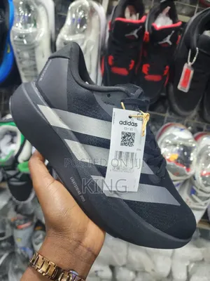 Adidas Adizero Evo Sl in a Black and Grey Color