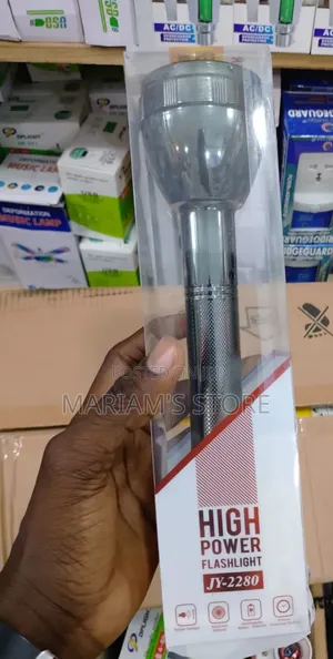 High-Power Rechargeable Flashlight With a Silver Aluminum Body.