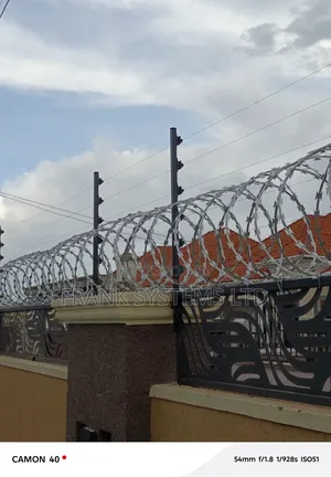 Electric Fence Installation With Surveillance Cameras