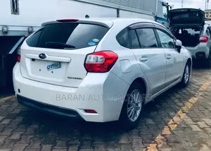 Subaru Impreza 2.0i Limited PZEV 4dr Hatchback AWD (2.0L 4cyl CVT) 2014 White