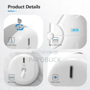 Wall-Mounted Plastic Paper Dispenser Likely for Commercial Use