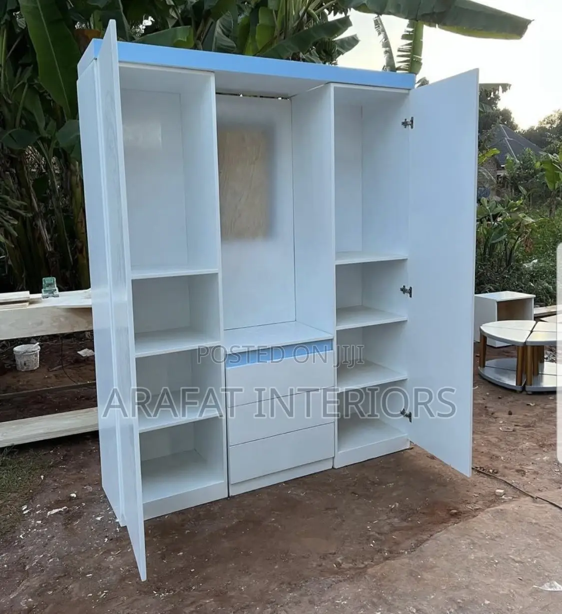 Custom White Wardrobe With Soft Blue Accents
