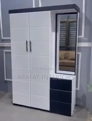 Stylish Modern Wardrobe in Crisp White With Bold Black Accents