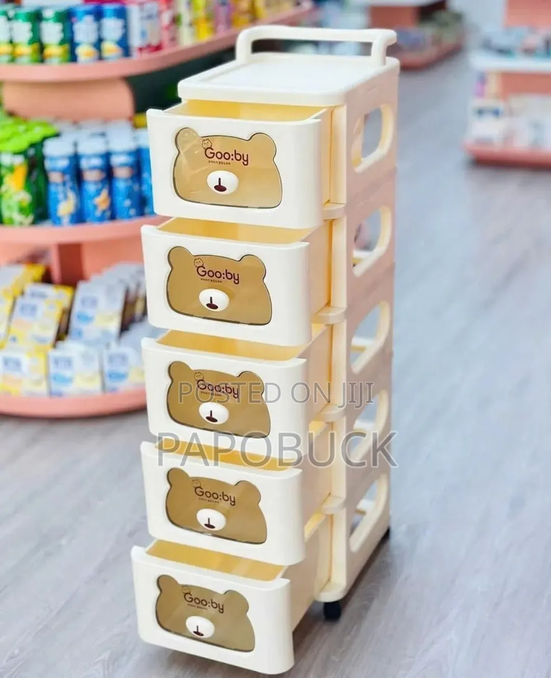 Beige Plastic Storage Chest Features Five Drawers