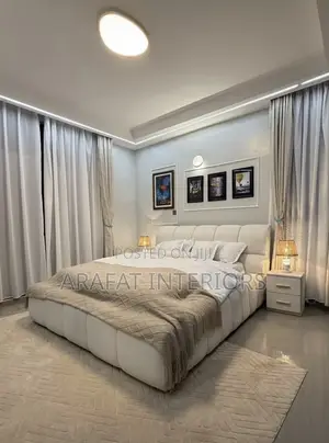 Beautiful Modern Upholstered Bed in Clean White/Cream Fabric