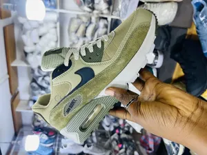 The Nike Air Max 90 Sneakers in a Neutral Olive Olive Colorway,