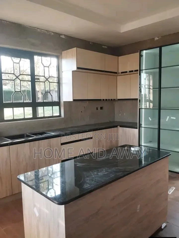 Lukman Ugandan Standard Kitchen Cabinets 800,000/- Per Running Meter