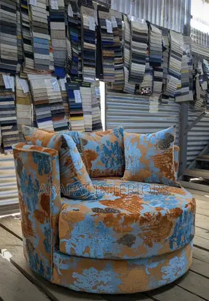 This Bold Circular Swivel Loveseat Is Pure Joy