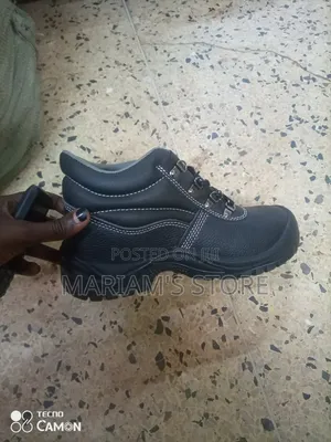 Black Zgh Brand Safety Shoes Feature A Durable, Waterproof Design.