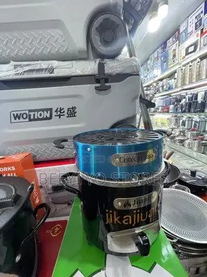 Portable "Jijuao" Brand Charcoal Stove With an Integrated Grill Top.