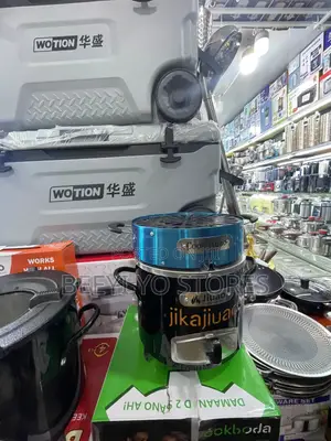 Portable "Jijuao" Brand Charcoal Stove With an Integrated Grill Top.