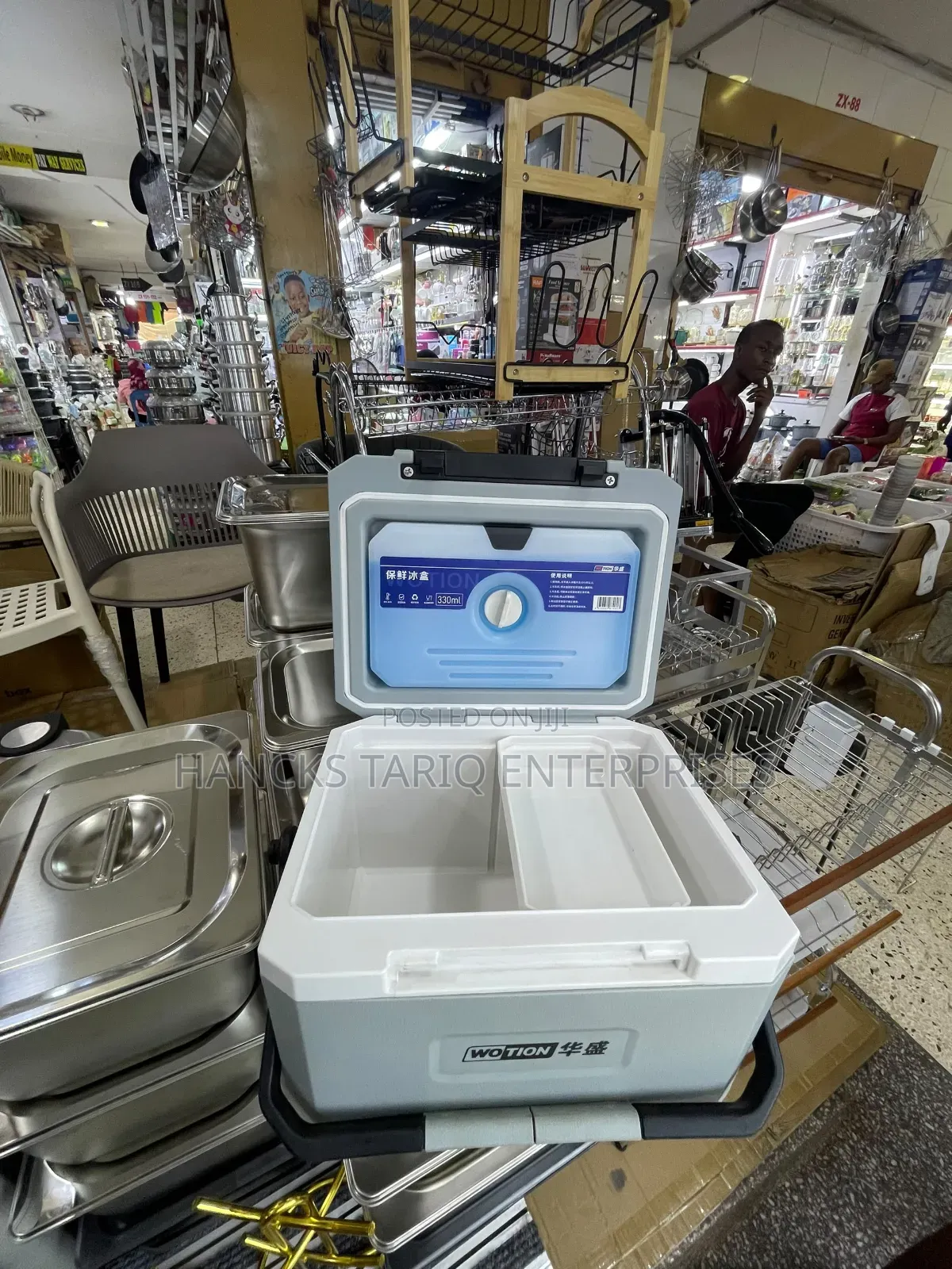 Portable Wotion-Branded Cooler Box.